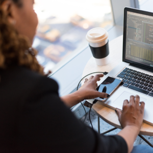 business woman working on laptop, content marketing